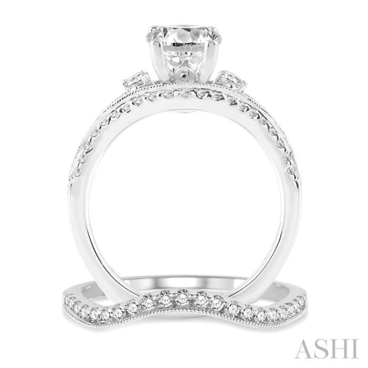 1 1/10 ctw Diamond Wedding Set with 1 ctw Round Cut Engagement Ring and 1/6 ctw Wedding Band in 14K White Gold
