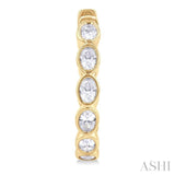 1 1/10 Ctw Bezel Set Oval Cut Diamond Fashion Hoop Earring in 14K Yellow Gold