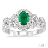 6x4 MM Oval Cut Emerald and 1/4 Ctw Round Cut Diamond Ring in 10K White Gold