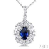 7x5 MM Oval Cut Sapphire and 5/8 Ctw Baguette & Round Cut Diamond Halo Precious Pendant With Chain in 14K White Gold
