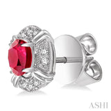 5x3 MM Oval Cut Ruby and 1/10 Ctw Round Cut Diamond Earrings in 14K White Gold