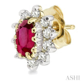 5x3MM Oval Cut Ruby and 1/4 ctw Round Cut Diamond Earrings in 14K Yellow Gold