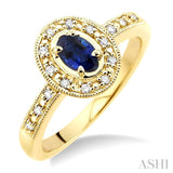 5x3 MM oval cut Sapphire and 1/10 Ctw Single Cut Diamond Ring in 10K Yellow Gold.