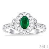 6X4 MM Oval Cut Emerald and 1/4 ctw Scalloped Halo Round Cut Diamond Precious Ring in 14K White Gold