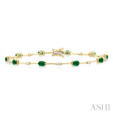 4x3 MM Oval Cut Emerald and 1/3 ctw Round Cut Diamond Precious Bar Bracelet in 10K Yellow Gold