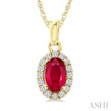 5x3 MM Oval Shape Ruby and 1/20 Ctw Round Cut Diamond Halo Precious Pendant with Chain in 10K Yellow Gold