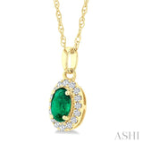 5x3 MM Oval Shape Emerald and 1/20 Ctw Round Cut Diamond Halo Precious Pendant with Chain in 10K Yellow Gold