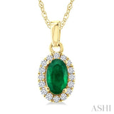 5x3 MM Oval Shape Emerald and 1/20 Ctw Round Cut Diamond Halo Precious Pendant with Chain in 10K Yellow Gold