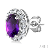 5x3 MM Oval Shape Amethyst and 1/8 Ctw Round Cut Diamond Halo Semi-Precious Stud Earrings in 10K White Gold