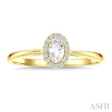 5x3 MM Oval Shape White Topaz and 1/20 Ctw Round Cut Diamond Halo Semi-Precious Ring in 10K Yellow Gold