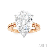 1/8 Ctw Pear Shape Round Cut Diamond Semi-Mount Engagement Ring in 14K Rose and White Gold