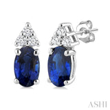1/20 Ctw Oval Cut 5X3 MM Sapphire and Round Cut Diamond Precious Earrings in 10K White Gold