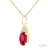 1/50 Ctw Oval Cut 6X4 MM Ruby and Round Cut Diamond Precious Pendant With Chain in 10K Yellow Gold