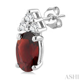 1/20 Ctw Oval Cut 5X3 MM Garnet and Round Cut Diamond semi-precious Earrings in 10K White Gold