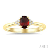 1/20 Ctw Oval Cut 6X4 MM Garnet and Round Cut Diamond semi-precious Ring in 10K Yellow Gold
