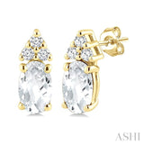 1/20 Ctw Oval Cut 5X3 MM White Topaz and Round Cut Diamond semi-precious Earrings in 10K Yellow Gold