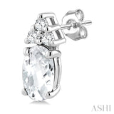 1/20 Ctw Oval Cut 5X3 MM White Topaz and Round Cut Diamond semi-precious Earrings in 10K White Gold