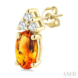 1/20 Ctw Oval Cut 5X3 MM Citrine and Round Cut Diamond semi-precious Earrings in 10K Yellow Gold