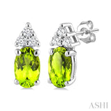 1/20 Ctw Oval Cut 5X3 MM Peridot and Round Cut Diamond semi-precious Earrings in 10K White Gold