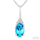 1/50 Ctw Oval Cut 6X4 MM Blue Topaz and Round Cut Diamond semi-precious Pendant With Chain in 10K White Gold