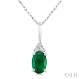 1/50 Ctw Oval Cut 6X4 MM Emerald and Round Cut Diamond Precious Pendant With Chain in 10K White Gold