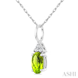 1/50 Ctw Oval Cut 6X4 MM Peridot and Round Cut Diamond Semi-Precious Pendant With Chain in 10K White Gold