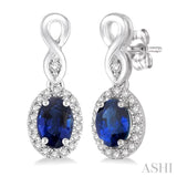 5x3 MM Oval Cut Sapphire and 1/6 ctw Round Cut Diamond Earrings in 10K White Gold