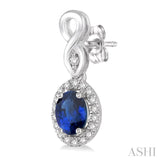 5x3 MM Oval Cut Sapphire and 1/6 ctw Round Cut Diamond Earrings in 10K White Gold