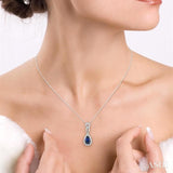 6x4 MM Pear Shape Sapphire and 1/10 Ctw Round Cut Diamond Pendant in 14K White Gold with Chain