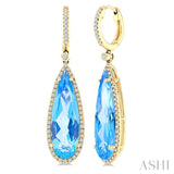 23X7 MM Evoque Gemstones Pear Shape Blue Topaz and 3/8 Ctw Round Cut Diamond Halo Semi-Precious Earrings in 14K Yellow Gold