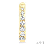 1/4 Ctw Graduated Round Cut Diamond Fashion Huggies in 14K Yellow Gold