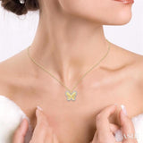 1/4 Ctw Fluted Texture Butterfly Round Cut Diamond Pirouette Fashion Pendant With Chain in 10K Yellow and White Gold